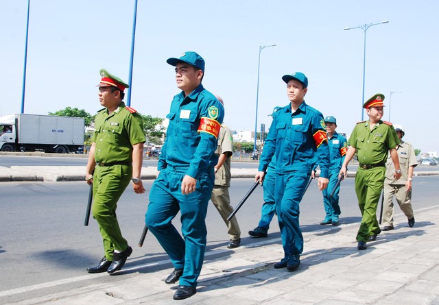 Hà Nội, TP Hồ Chí Minh dự kiến mức hỗ trợ hàng tháng đối với lực lượng bảo vệ an ninh, trật tự ở cơ sở- Ảnh 2.