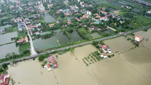 Hình ảnh từ trên cao loạt nhà dân ở Nam Định bị ngập trong nước- Ảnh 7.