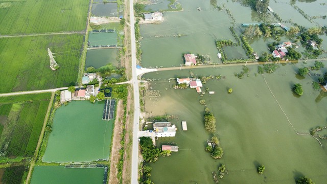 Nam Định: Nước rút chậm người dân vùng 'lũ' ở Ý Yên mòn mỏi ngày 'trở về' - Ảnh 2.