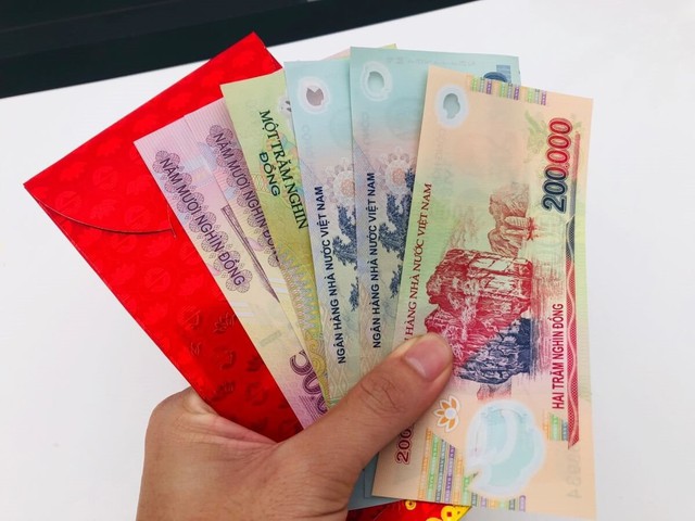 Tiền mừng tuổi Tết B&iacute;nh Ngọ 2026 từ bao nhi&ecirc;u c&oacute; thể gửi tiết kiệm? - Ảnh 2.
