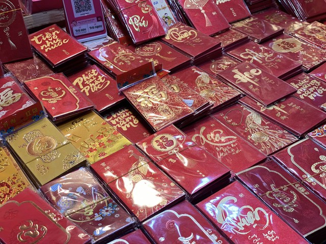 Những mẫu lì xì nào đang được người tiêu dùng không tiếc tiền chi trong dịp Tết 2026? - Ảnh 5. Những mẫu lì xì nào đang được người tiêu dùng không tiếc tiền chi trong dịp Tết 2026? - Ảnh 5.