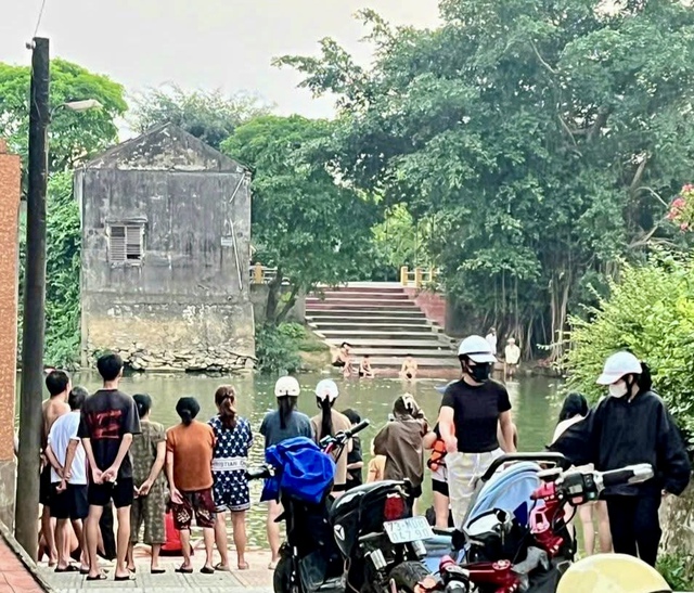 Nam sinh tử vong sau c&uacute; nhảy từ c&acirc;y cao xuống s&ocirc;ng - Ảnh 1.