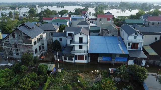 Hiện trạng cuộc sống người d&acirc;n th&ocirc;n ven s&ocirc;ng T&iacute;ch sau 1 tuần ngập lũ 2026 - Ảnh 7.