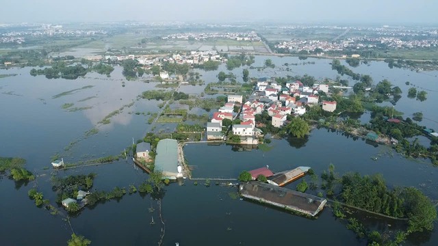 Hiện trạng cuộc sống người d&acirc;n th&ocirc;n ven s&ocirc;ng T&iacute;ch sau 1 tuần ngập lũ 2026 - Ảnh 8.