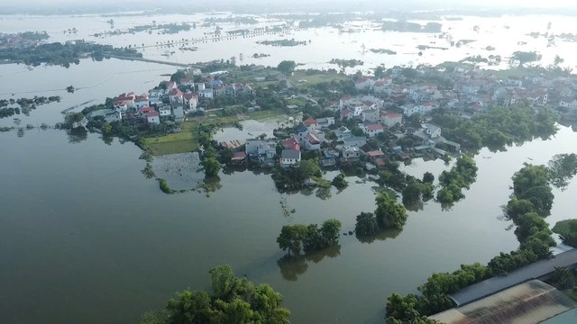 Hiện trạng cuộc sống người d&acirc;n th&ocirc;n ven s&ocirc;ng T&iacute;ch sau 1 tuần ngập lũ 2026 - Ảnh 10.