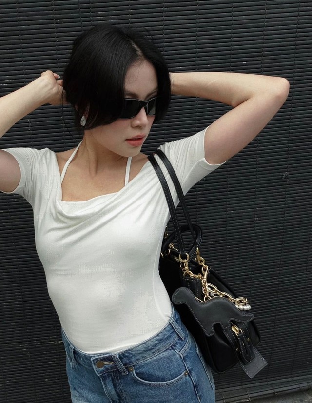 Ho&agrave;ng Th&ugrave;y Linh diện mạo kh&aacute;c lạ với gu thời trang biến ho&aacute; - Ảnh 9.