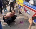 Tên cướp taxi bị người dân khống chế ở Hà Nội đang có lệnh truy nã tội giết người