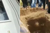 Rợn tóc gáy xác chết “vẫy tay” trong quan tài Rợn tóc gáy xác chết “vẫy tay” trong quan tài