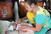 Đã xác định cha mẹ cháu bé bị chôn sống Đã xác định cha mẹ cháu bé bị chôn sống