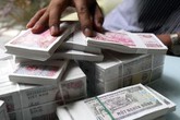 Gần Tết, dịch vụ đổi tiền lẻ bắt đầu sôi động Gần Tết, dịch vụ đổi tiền lẻ bắt đầu sôi động