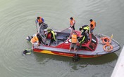 Công an lặn sông tìm súng của nghi phạm bắn chết người Trung Quốc Công an lặn sông tìm súng của nghi phạm bắn chết người Trung Quốc