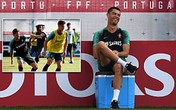 Ronaldo đùa giỡn trên sân tập trước thất bại của Messi Ronaldo đùa giỡn trên sân tập trước thất bại của Messi