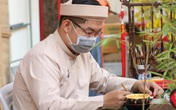 Ông đồ mang khẩu trang xuống phố múa bút chúc Tết ở Sài Gòn Ông đồ mang khẩu trang xuống phố múa bút chúc Tết ở Sài Gòn