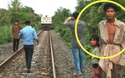 Bố lôi con gái chạy ra chặn tàu lửa đang lao đến khiến người lái tàu bối rối, hành động tưởng như điên rồ cứu sống 2.000 con người Bố lôi con gái chạy ra chặn tàu lửa đang lao đến khiến người lái tàu bối rối, hành động tưởng như điên rồ cứu sống 2.000 con người