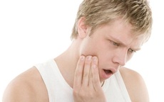 Đau quai hàm do mọc răng khôn phải làm sao?