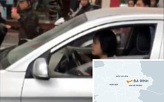 Nữ tài xế lái ôtô đẩy cảnh sát giao thông đi hơn trăm mét trên phố