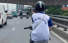 Vừa điều khiển xe máy vừa lướt 'TikTok', nữ sinh ở Hà Nội bị phạt nặng