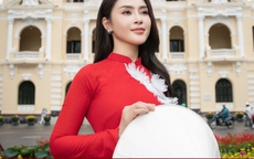 Hoa hậu Lý Kim Thảo thướt tha trong tà áo dài đỏ thêu bồ câu trắng