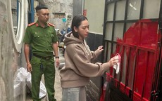 Bắt cô gái tạt sơn nhà người yêu cũ