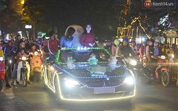 Xe BMW mui trần trang trí đèn rực rỡ lượn khắp phố Bà Triệu