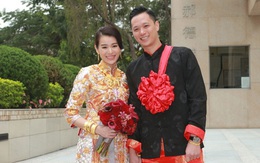 Cô dâu Hồ Hạnh Nhi đeo vàng trĩu tay trong ngày cưới