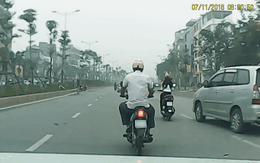 Phẫn nộ xe Innova vượt ẩu, tông ngã cô gái giữa đường phố Hà Nội rồi thản nhiên chạy tiếp