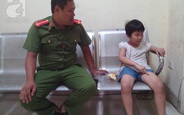 Hà Nội: Bé gái khoảng 7 tuổi đi lạc đang được cảnh sát chăm sóc chờ người nhà đón về