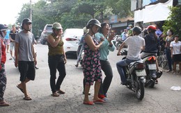 Người mẹ gào khóc khi thấy thi thể con dưới sông