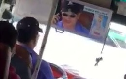 Nghe điện thoại chạy 50 km/h, tài xế xe buýt bị đình công tác