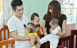 Vợ chồng Phi Thanh Vân bế con trai 8 tháng tuổi đi từ thiện