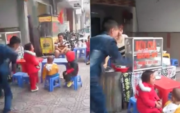 Clip gây phẫn nộ: "Ông bố địu con nhặt rác" dùng thắt lưng đánh con gái dã man trên phố Hà Nội