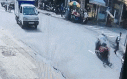 Tên cướp kéo lê cô gái trên đường