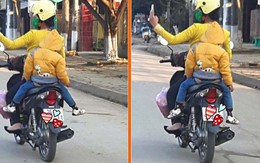 Thót tim cảnh bà mẹ chở hai con trên xe máy vẫn vô tư chụp ảnh tự sướng
