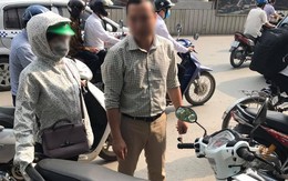 Bắt đền sau va chạm giao thông bất thành, tài xế ô tô ném chìa khóa xe máy của người phụ nữ