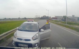 Bị chặn đầu trên đường ngược chiều, tài xế taxi rút tuýp sắt đe dọa người khác