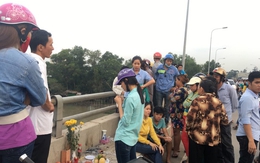 Cô gái ngây dại đứng nhìn người yêu gieo mình xuống sông Sài Gòn tự tử