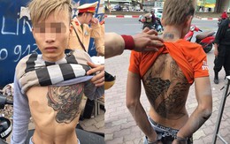 Cặp đôi tuổi teen xăm hình rồng vứt xe máy khi thấy cảnh sát