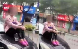 Hoảng hốt cảnh người phụ nữ ngồi bất động trên mũi xe đang đi với tốc độ cao
