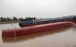 Tàu chở đá lật úp, chồng chết, vợ mất tích