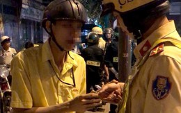 "Ma men" dùng mũ bảo hiểm tấn công cảnh sát giao thông ở Sài Gòn