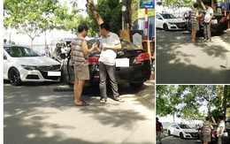 Sau va chạm xe, hai tài xế xuống bắt tay nhau và phân làn đường
