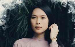 Tưng tửng là thế nhưng khi diện áo dài, Mỹ Tâm cũng dịu dàng đến lạ!