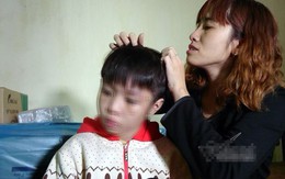 Bé trai bị bố và mẹ kế đánh rạn sọ não xin tha cho bố