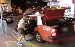 Chê đường gần, tài xế taxi Hong Kong dọa khách bằng thanh kim loại
