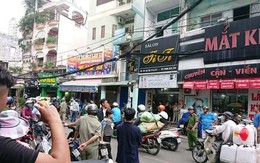Nghi can cướp giật dùng mảnh kính doạ tự tử khi bị công an truy bắt