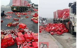 Xe chở nước ngọt gặp nạn ngày giáp Tết, người dân lao vào giúp đỡ tài xế thu dọn