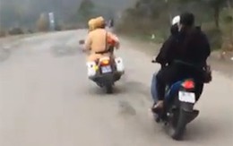 Đôi nam nữ chạy xe đánh võng thách thức cảnh sát giao thông