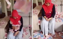 Ném 'mưa' tiền vào mặt bạn sau khi bị bạn cướp chồng
