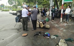 Xe máy tay ga bốc cháy dữ dội khi dừng đèn đỏ