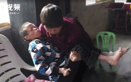 Người phụ nữ hơn 30 năm chăm sóc hàng xóm tàn tật như người thân